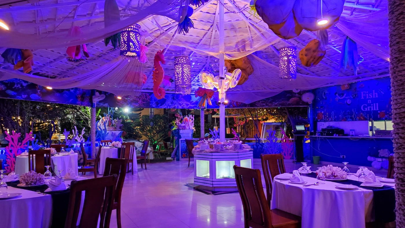 Fish n' Grill seafood restaurant with coral-inspired interiors